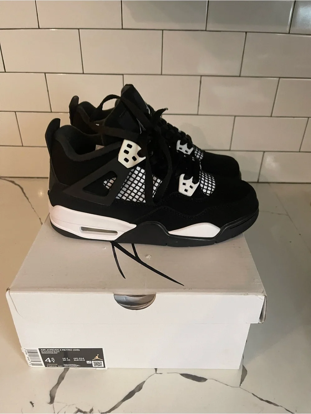 Men’s Retro 4 White Thunder Size 4.5.